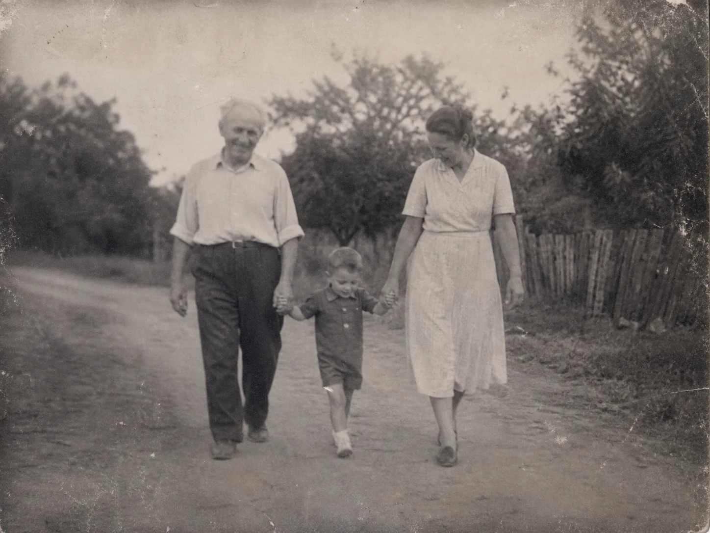 Black-and-white family photograph before restoration