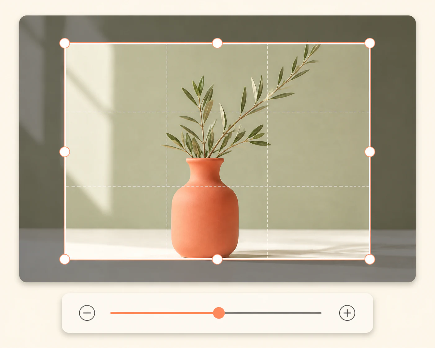 Image crop canvas with a thirds grid, resize handles, and a zoom slider